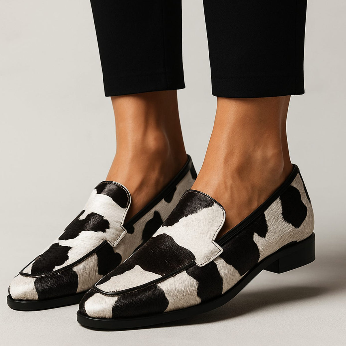 Women's Pointed-Toe Loafers with Cow Print Slip-On Design